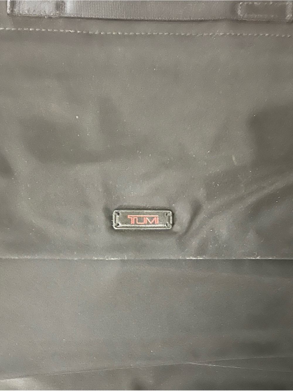 Tumi Black Travel/Stroller Bag with Red Logo Accent
